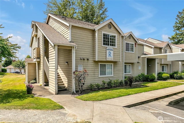 1835 S 286th Ln Unit R201, Federal Way, WA 98003 - view of property featuring a front lawn