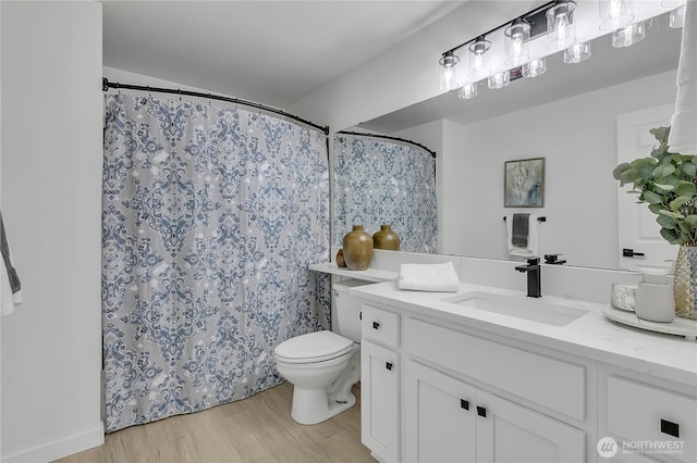 1835 S 286th Ln Unit R201, Federal Way, WA 98003 - bathroom featuring vanity, wood finished floors, and a shower with shower curtain