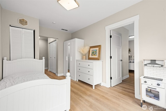 5116 N 40th St, Tacoma, WA 98407 - bedroom featuring light wood finished floors and baseboards