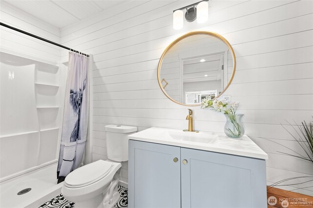 5116 N 40th St, Tacoma, WA 98407 - full bathroom featuring vanity, a shower with shower curtain, and wooden walls