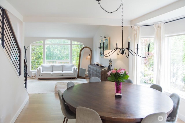 903 198th Ave E, Lake Tapps, WA 98391 - dining space featuring wood finished floors and arched walkways