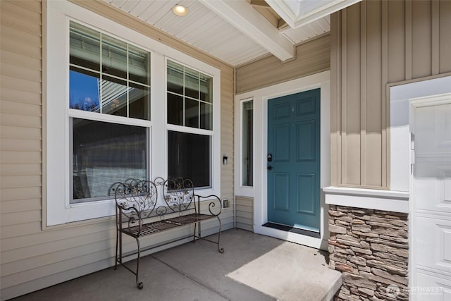 21609 46th Pl S Unit 95, Kent, WA 98032 - view of exterior entry with board and batten siding and covered porch