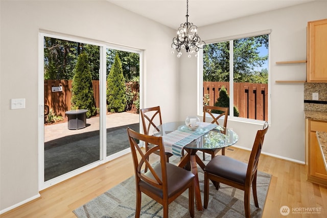 21609 46th Pl S Unit 95, Kent, WA 98032 - dining room featuring light wood-style floors and a chandelier