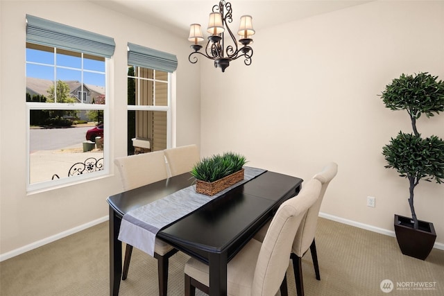 21609 46th Pl S Unit 95, Kent, WA 98032 - dining area featuring carpet and a chandelier
