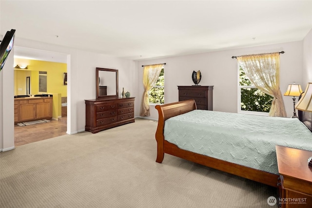 21609 46th Pl S Unit 95, Kent, WA 98032 - bedroom featuring light colored carpet and ensuite bathroom
