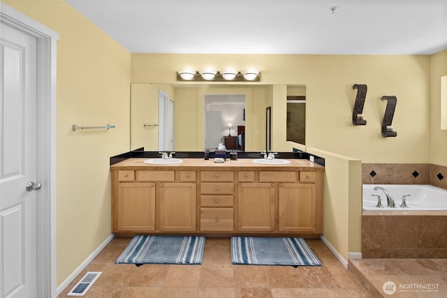 21609 46th Pl S Unit 95, Kent, WA 98032 - bathroom with double vanity and a garden tub