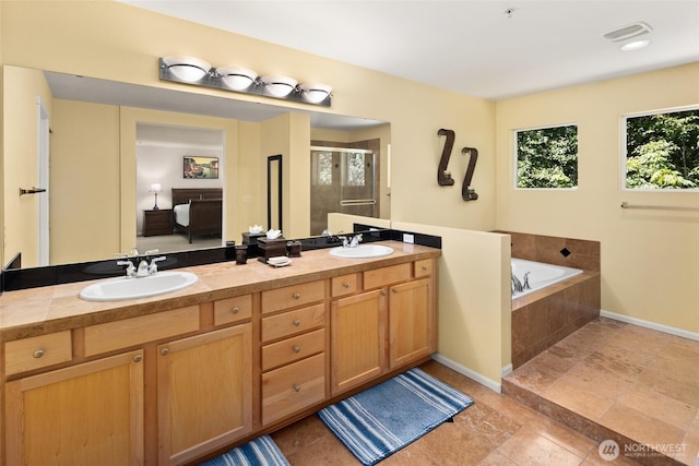 21609 46th Pl S Unit 95, Kent, WA 98032 - ensuite bathroom with a shower stall, double vanity, a garden tub, and stone tile flooring