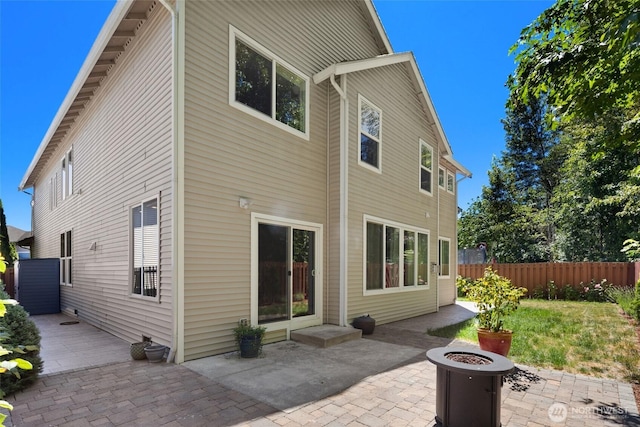21609 46th Pl S Unit 95, Kent, WA 98032 - back of house with a patio area and an outdoor fire pit