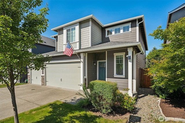 20122 18th Avenue Ct E, Spanaway, WA 98387 - traditional-style house with driveway and an attached garage