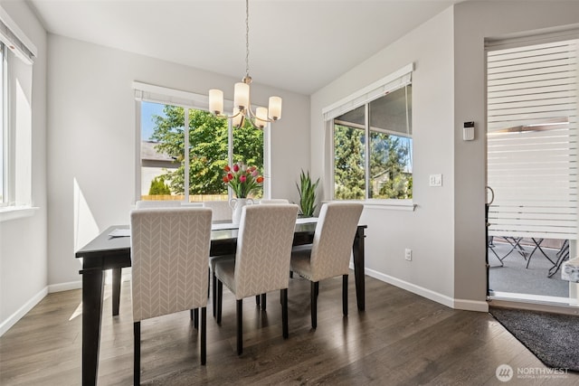 20122 18th Avenue Ct E, Spanaway, WA 98387 - dining space featuring a chandelier, wood finished floors, and healthy amount of natural light