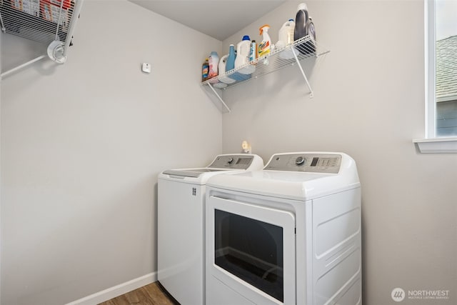 20122 18th Avenue Ct E, Spanaway, WA 98387 - laundry area with washer and dryer and wood finished floors