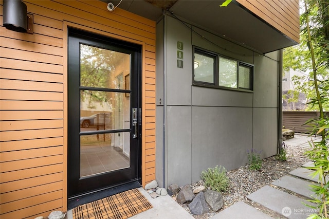 201 20th Ave E, Seattle, WA 98112 - view of exterior entry featuring a security system