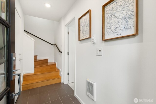 201 20th Ave E, Seattle, WA 98112 - entrance foyer with recessed lighting, heating unit, dark tile patterned flooring, and stairway