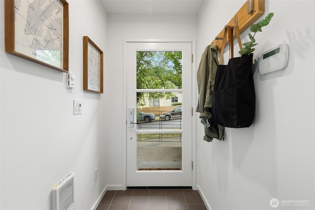 201 20th Ave E, Seattle, WA 98112 - doorway with baseboards and heating unit