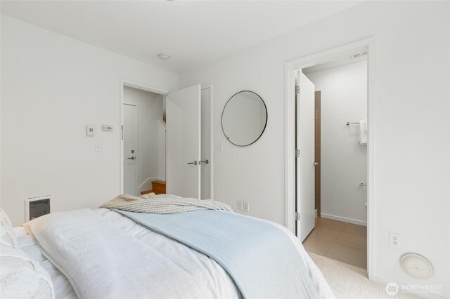 201 20th Ave E, Seattle, WA 98112 - bedroom with light tile patterned floors and baseboards