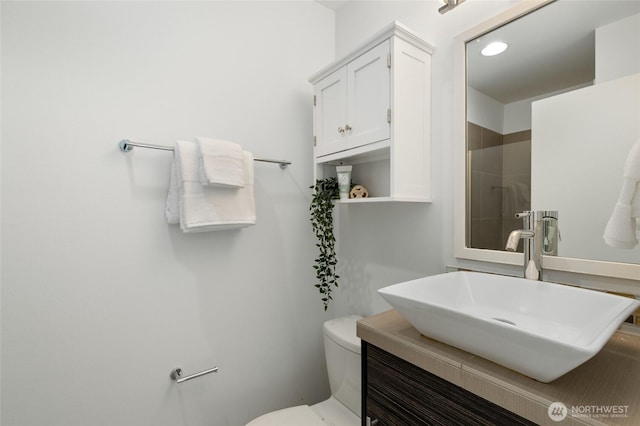 201 20th Ave E, Seattle, WA 98112 - bathroom featuring vanity and tiled shower