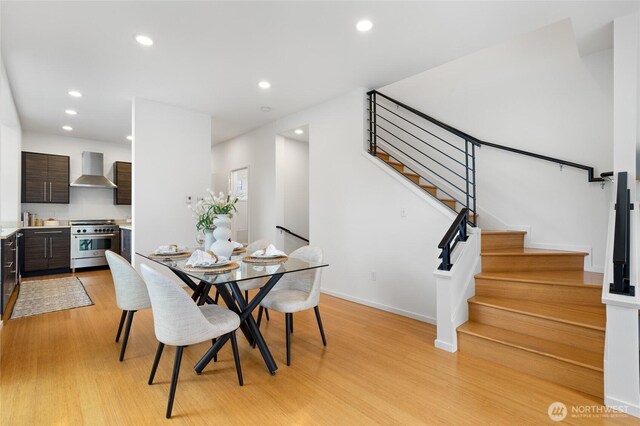 201 20th Ave E, Seattle, WA 98112 - dining space with light wood finished floors, stairway, and recessed lighting
