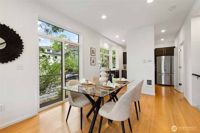 201 20th Ave E, Seattle, WA 98112 - dining room with light wood-style flooring and recessed lighting