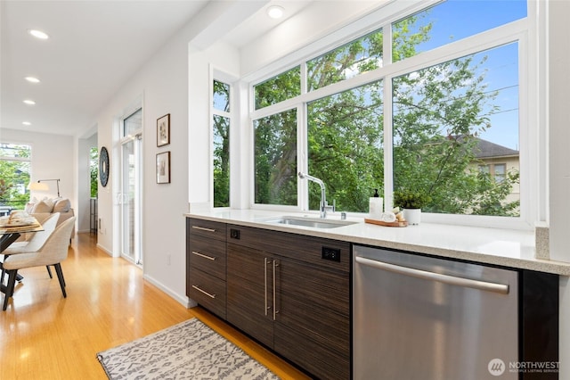 201 20th Ave E, Seattle, WA 98112 - kitchen featuring dishwasher, light wood-style floors, recessed lighting, modern cabinets, and dark brown cabinetry
