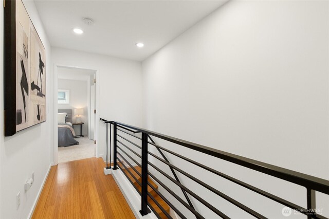 201 20th Ave E, Seattle, WA 98112 - hallway with an upstairs landing, recessed lighting, and light wood-style floors