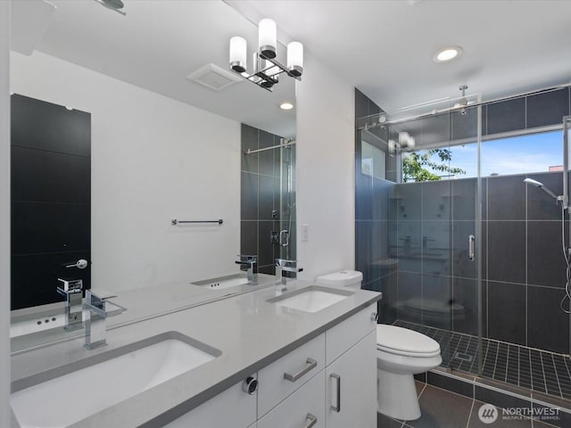 733 Martin Luther King Jr Way, Seattle, WA 98144 - bathroom with a shower stall, double vanity, tile patterned flooring, and recessed lighting