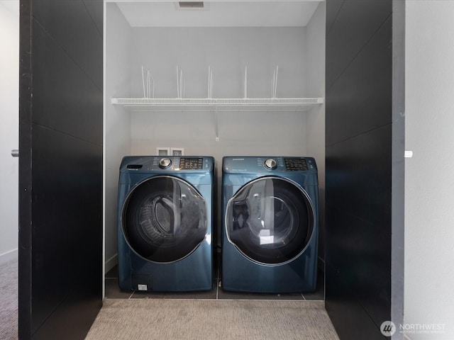 733 Martin Luther King Jr Way, Seattle, WA 98144 - washroom with washing machine and clothes dryer and carpet flooring