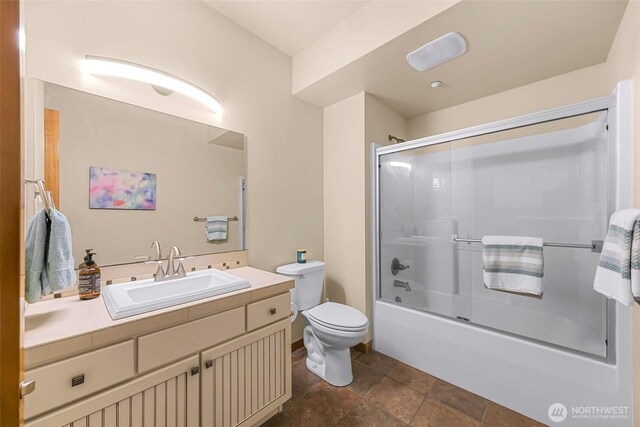 7714 Birch Bay Dr Unit 203, Blaine, WA 98230 - full bathroom featuring vanity, shower / bath combination with glass door, and stone finish floors