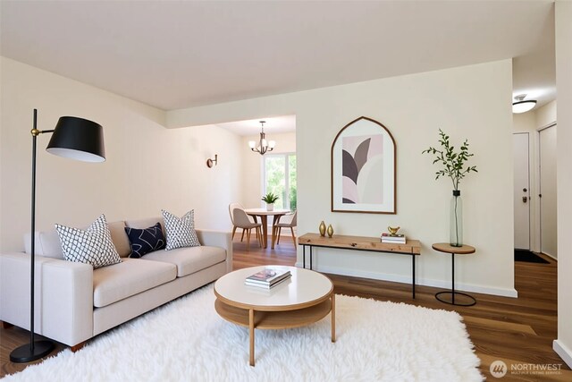 5029 84th St SW Unit 301, Mukilteo, WA 98275 - living room featuring wood finished floors and a chandelier