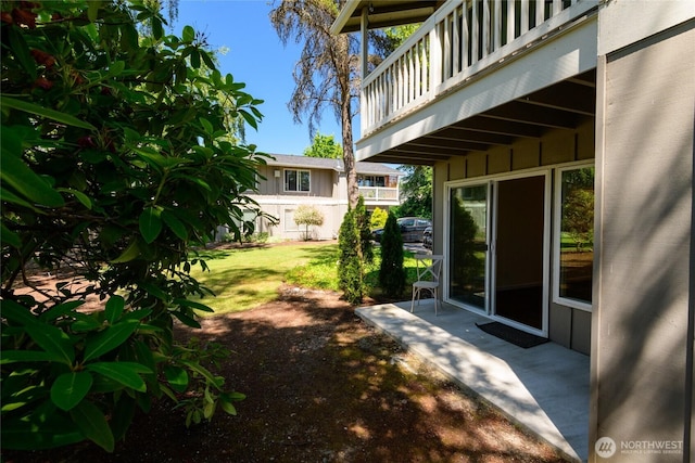 5029 84th St SW Unit 301, Mukilteo, WA 98275 - view of grassy yard with a balcony and a patio area