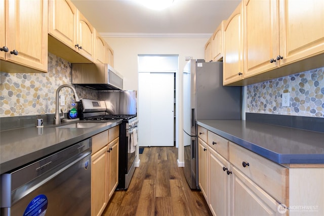5029 84th St SW Unit 301, Mukilteo, WA 98275 - kitchen featuring stainless steel appliances, light brown cabinets, ornamental molding, dark wood-style floors, and dark countertops