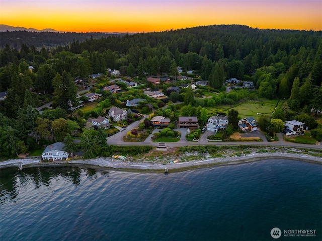 9882 Manitou Beach Dr NE, Bainbridge Island, WA 98110 - aerial view at dusk of a view of trees, a water view, and a residential view
