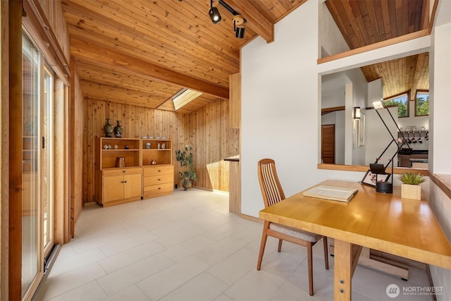 9882 Manitou Beach Dr NE, Bainbridge Island, WA 98110 - dining room featuring wood ceiling, wooden walls, and track lighting