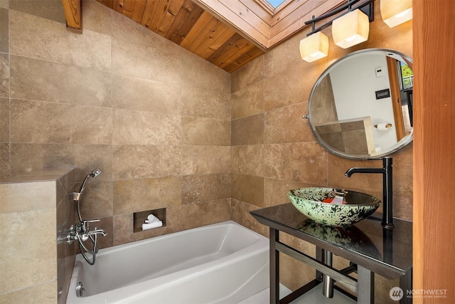 9882 Manitou Beach Dr NE, Bainbridge Island, WA 98110 - full bath featuring a skylight, wood ceiling, vanity, and lofted ceiling