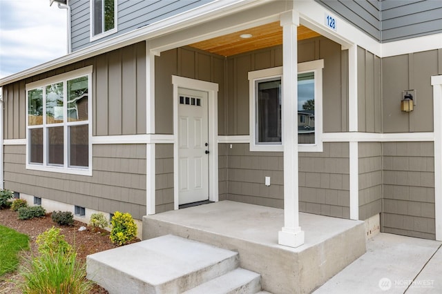 128 N Trail Rd, Sedro Woolley, WA 98284 - entrance to property featuring board and batten siding and a porch