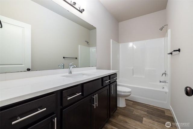 128 N Trail Rd, Sedro Woolley, WA 98284 - full bathroom with vanity, wood finished floors, and  shower combination