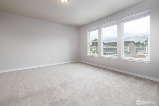 128 N Trail Rd, Sedro Woolley, WA 98284 - unfurnished room with baseboards and light colored carpet