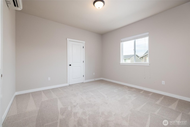 128 N Trail Rd, Sedro Woolley, WA 98284 - empty room featuring an AC wall unit and light carpet