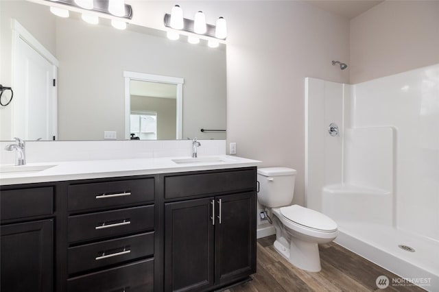 128 N Trail Rd, Sedro Woolley, WA 98284 - full bathroom with wood finished floors, double vanity, and a shower