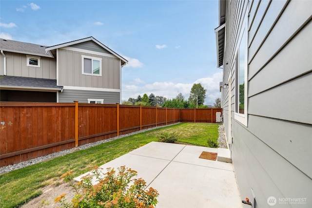 128 N Trail Rd, Sedro Woolley, WA 98284 - fenced backyard with a patio area