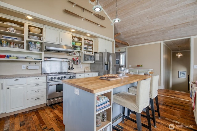 604 Ocean Shores Blvd SW, Ocean Shores, WA 98569 - kitchen with stainless steel appliances, open shelves, under cabinet range hood, wood ceiling, and wooden counters