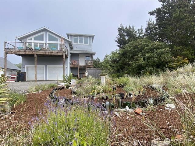 604 Ocean Shores Blvd SW, Ocean Shores, WA 98569 - view of front facade featuring a garage and driveway