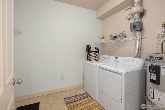 300 110th Ave NE Unit 303, Bellevue, WA 98004 - laundry area with water heater and washer and dryer