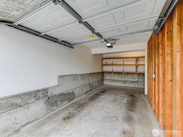 17201 127th Pl NE Unit 101, Woodinville, WA 98072 - garage with a garage door opener