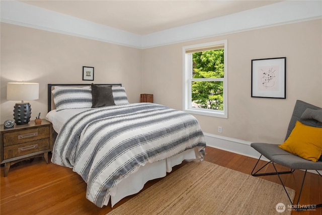 2401 10th Ave W, Seattle, WA 98119 - bedroom with wood finished floors and baseboards