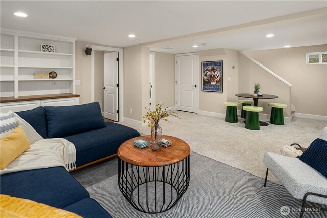 2401 10th Ave W, Seattle, WA 98119 - carpeted living room featuring recessed lighting and stairway