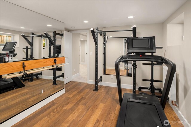 2401 10th Ave W, Seattle, WA 98119 - workout room featuring wood finished floors and recessed lighting
