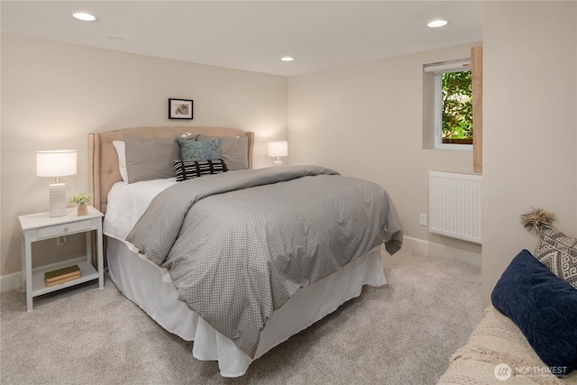 2401 10th Ave W, Seattle, WA 98119 - bedroom with radiator heating unit, carpet flooring, and recessed lighting