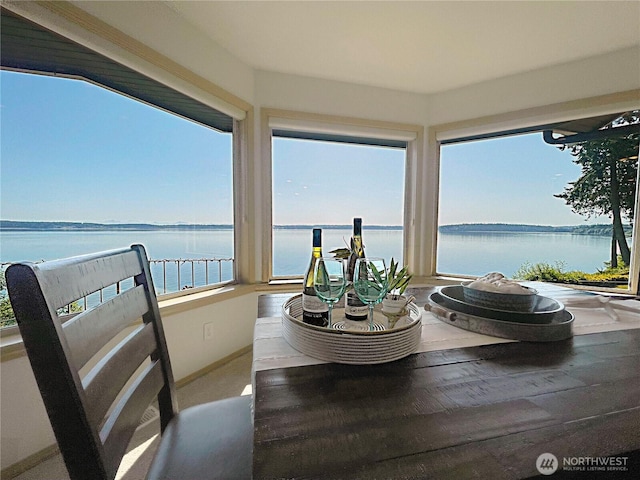 212 Tala Shore Dr, Port Ludlow, WA 98365 - sunroom with a water view and baseboards