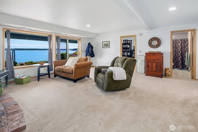 212 Tala Shore Dr, Port Ludlow, WA 98365 - living room featuring healthy amount of natural light, beam ceiling, carpet, recessed lighting, and a water view