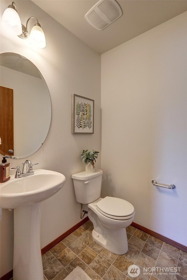 1011 S 64th St, Tacoma, WA 98408 - half bath featuring stone finish flooring